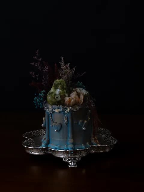 Blue cake with dried flowers